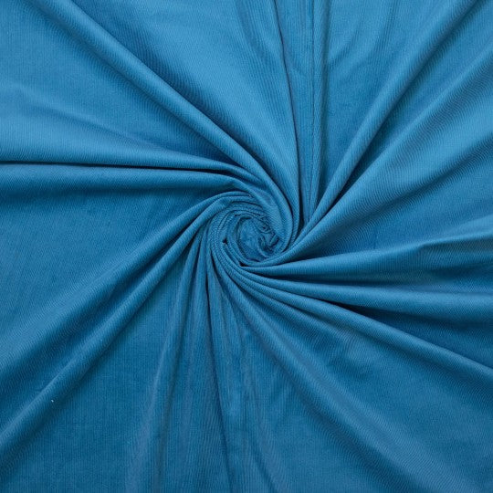 Gewaschener Feincord in petrol – weicher Baumwollstoff mit feiner Rippenstruktur, ideal für Kleidung & Accessoires.