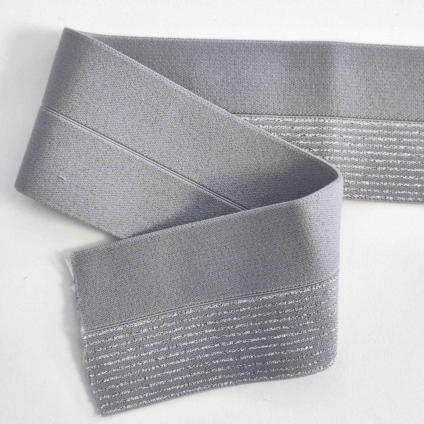 Elastisches Einfassband 60mm Glitzer silber