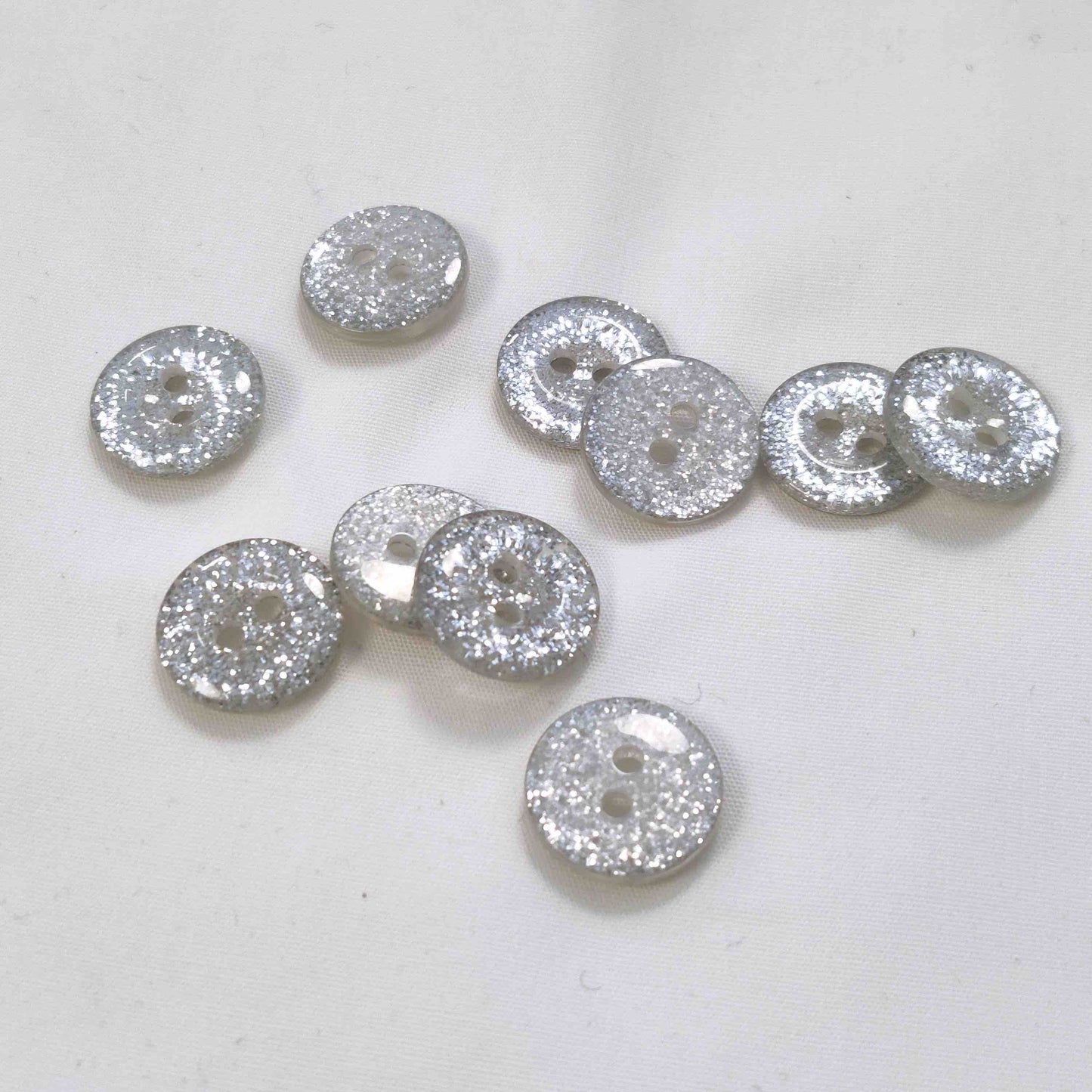 Polyesterknopf Glitzer, 2-Loch 15 mm