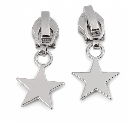 Bügelschieber für 6 mm Spiralreißverschluss mit Autolock und silbernem Stern-Anhänger. Ideal für Taschen, Jacken oder Accessoires.