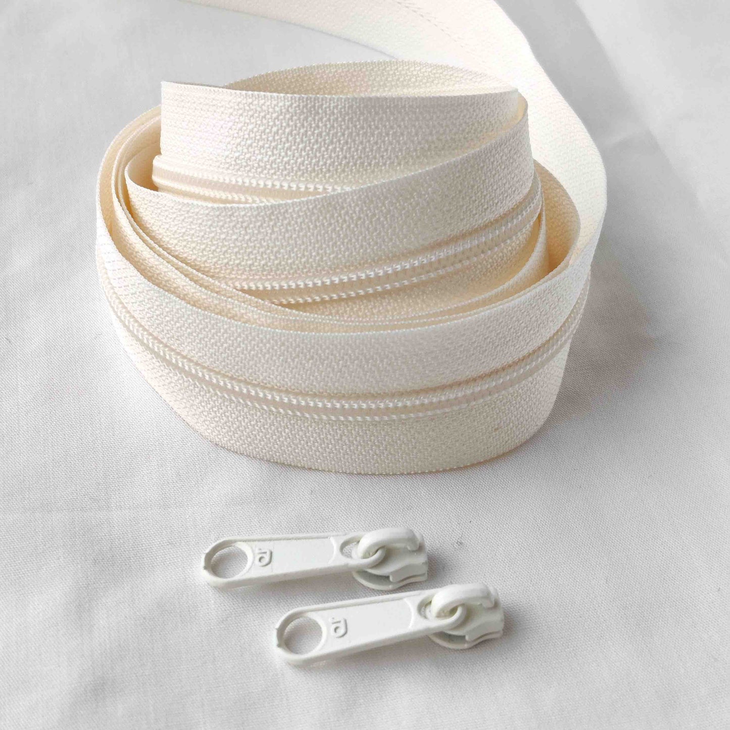 Endlos Reißverschluss mit 3 mm Spirale creme weiß