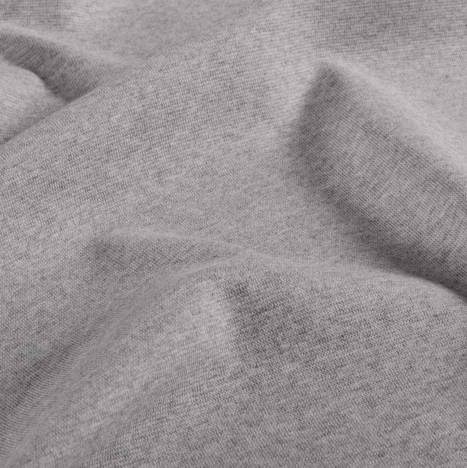Bündchen Melange, elastischer Schlauchstoff in Melange-Optik. Aus 62% Baumwolle, 33% Polyester und 5% Elasthan. Ideal für Ärmel, Säume & Hoodies.