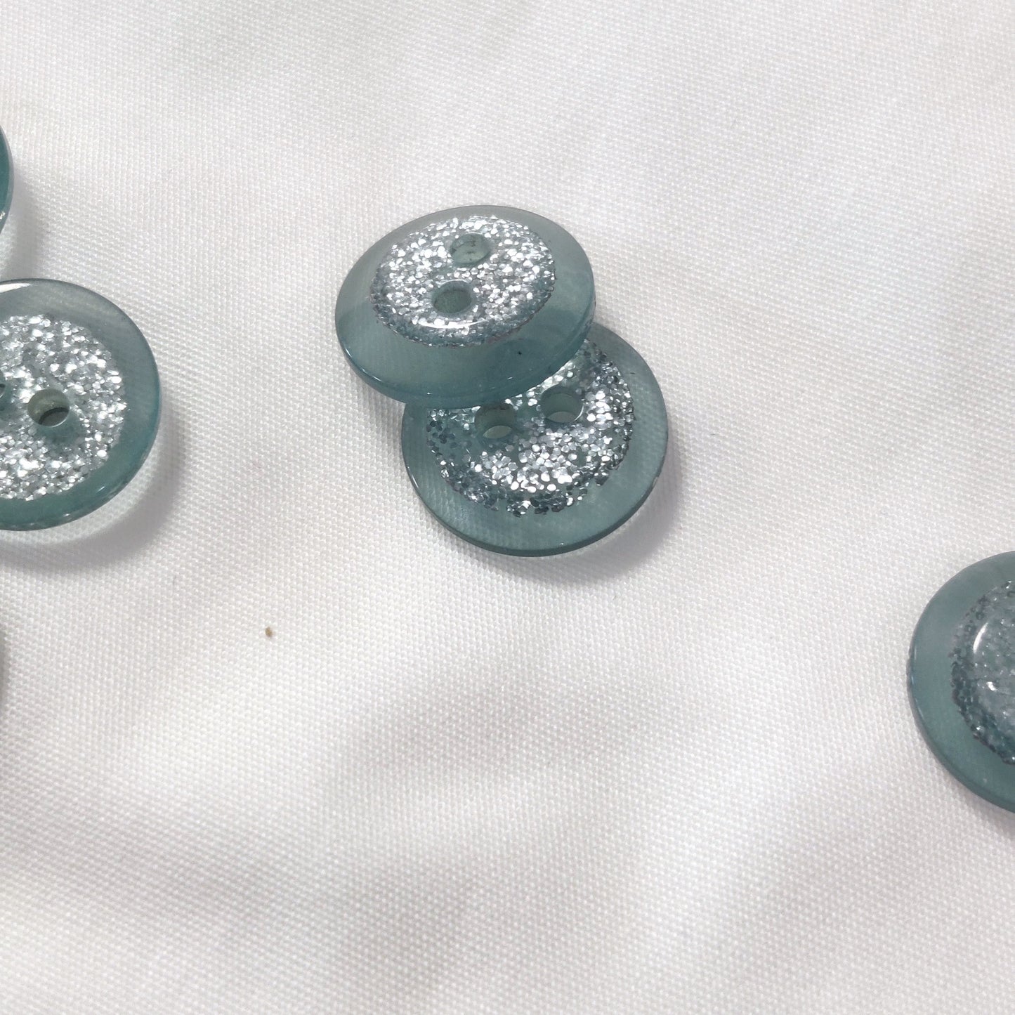 2-Loch Polyesterknopf 23mm Glitzer