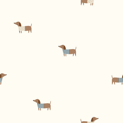 Jersey “Cozy Dachshunds” mit kleinen Dackeln im Pullover. Weicher, elastischer Stoff für Kinderkleidung und Accessoires.