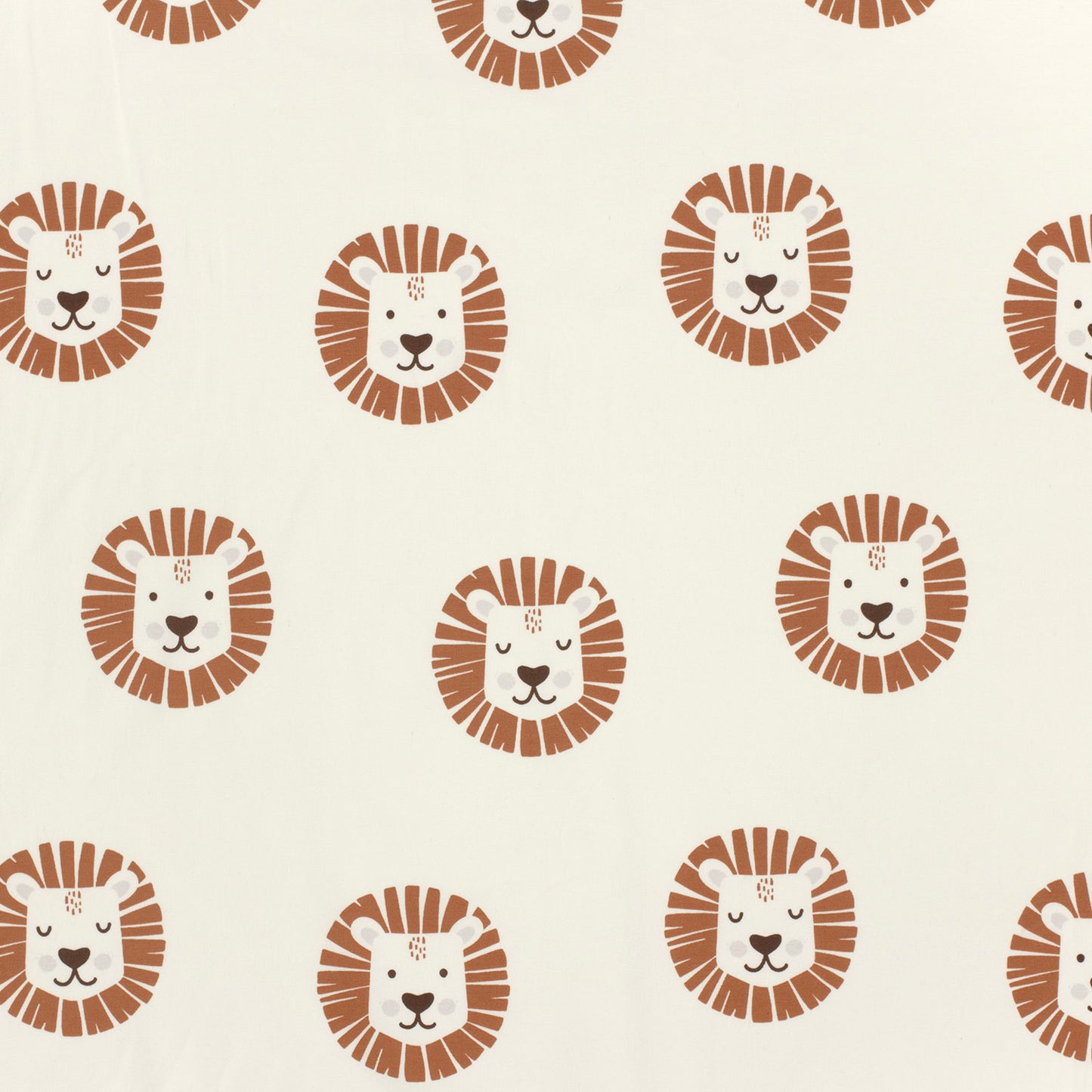 Kinderjersey mit Löwenköpfen, teils mit offenen, teils mit geschlossenen Augen. Weicher, elastischer Stoff für Kindermode.