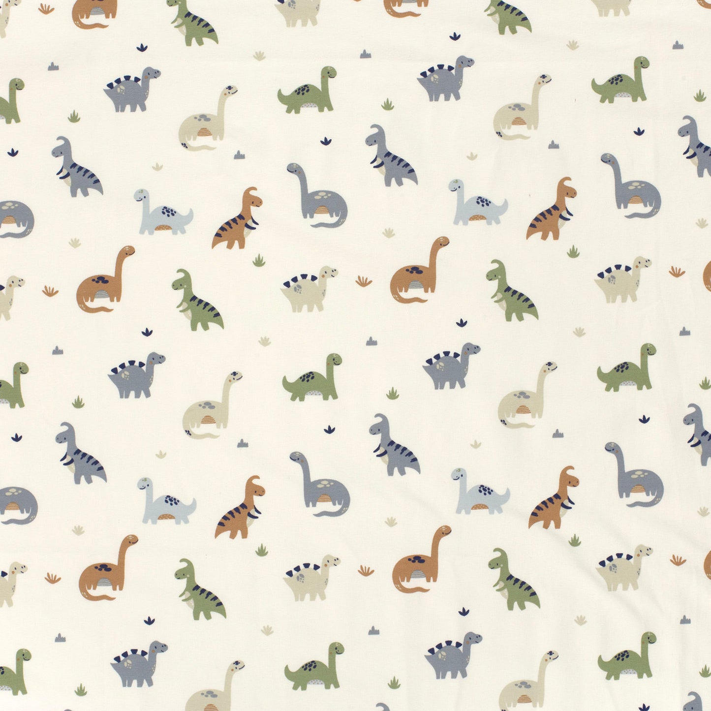 Kinderjersey mit kleinen Dinosauriern. Weicher, elastischer Stoff für Kindermode wie Shirts, Hosen, Kleider und Schlafanzüge.