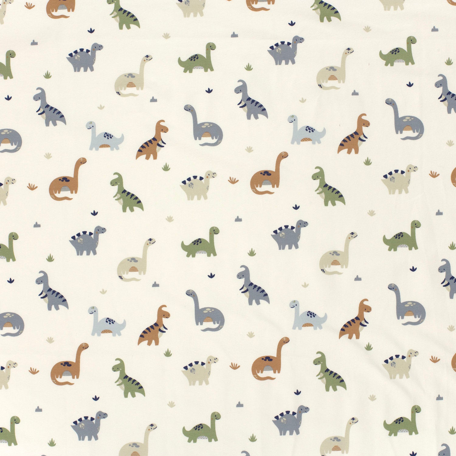 Kinderjersey mit kleinen Dinosauriern. Weicher, elastischer Stoff für Kindermode wie Shirts, Hosen, Kleider und Schlafanzüge.