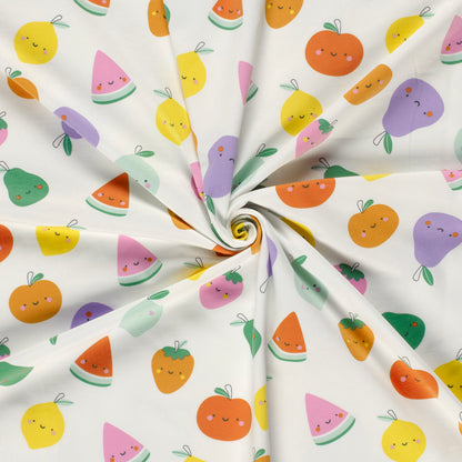 Jersey “Happy Fruits” mit buntem Obst und Gesichtern. Weich, elastisch und ideal für Kinderkleidung, Shirts, Kleider oder Accessoires.