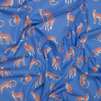 Bedruckter Baumwollstoff Popeline mit Leoparden in Blau