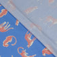 Bedruckter Baumwollstoff Popeline mit Leoparden in Blau