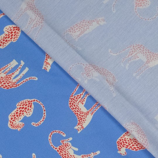 Bedruckter Baumwollstoff Popeline mit Leoparden in Blau