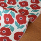 KOKKA Linnea Pure Blossom Oxford Baumwollstoff mit roten Blumen und türkisgrünen Blättern