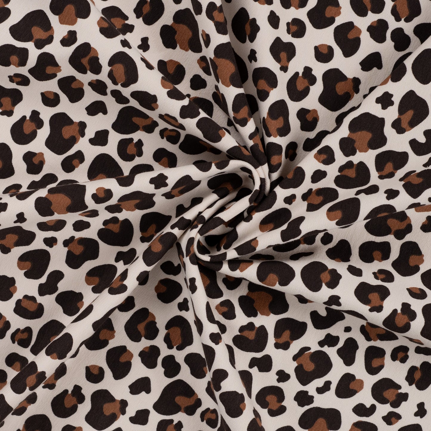 French Terry mit Leomuster – Baumwollstoff, außen glatt, innen mit Schlaufen, ideal für Kleidung.