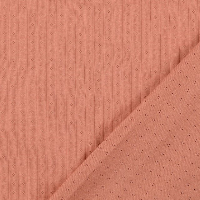 Pointoille Baumwolljersey in apricot mit feinem Lochmuster