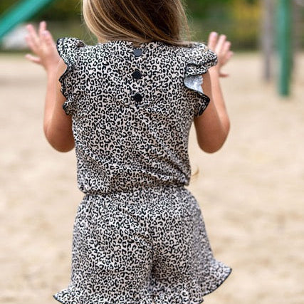 Jersey mit feinem Leopardenmuster in Beige und Schwarz.