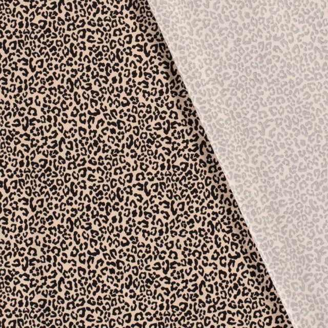 Jerseystoff mit feinem Leopardenmuster in Beige und Schwarz.