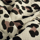 Musselin Leo Natur-Taupe – Baumwollstoff mit Leopardenmuster