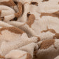 Teddy Jacquard mit braunen Dackeln auf cremefarbenem Grund