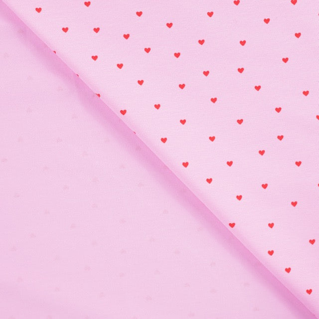 Single Jersey „Herzklopfen“ in Rosa mit kleinen roten Herzen