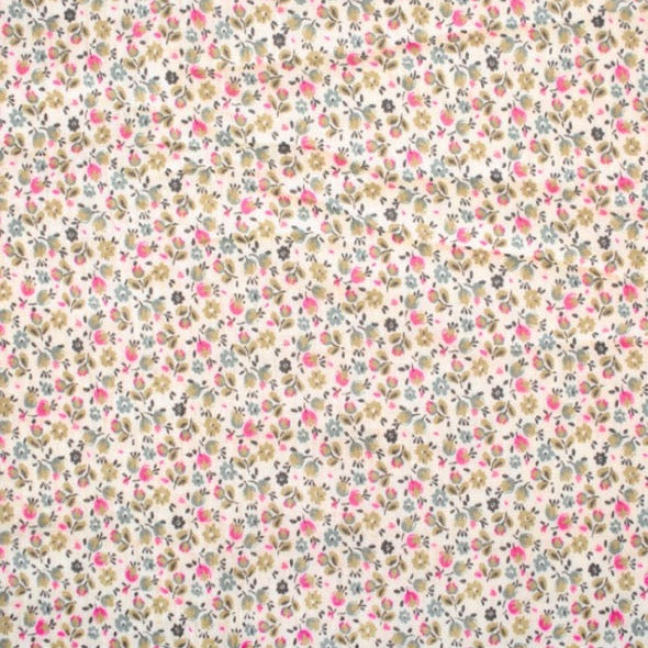 Weicher Musselin mit kleinen floralen Motiven in zarten Farben.
