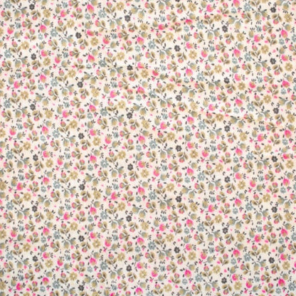 Weicher Musselin mit kleinen floralen Motiven in zarten Farben.