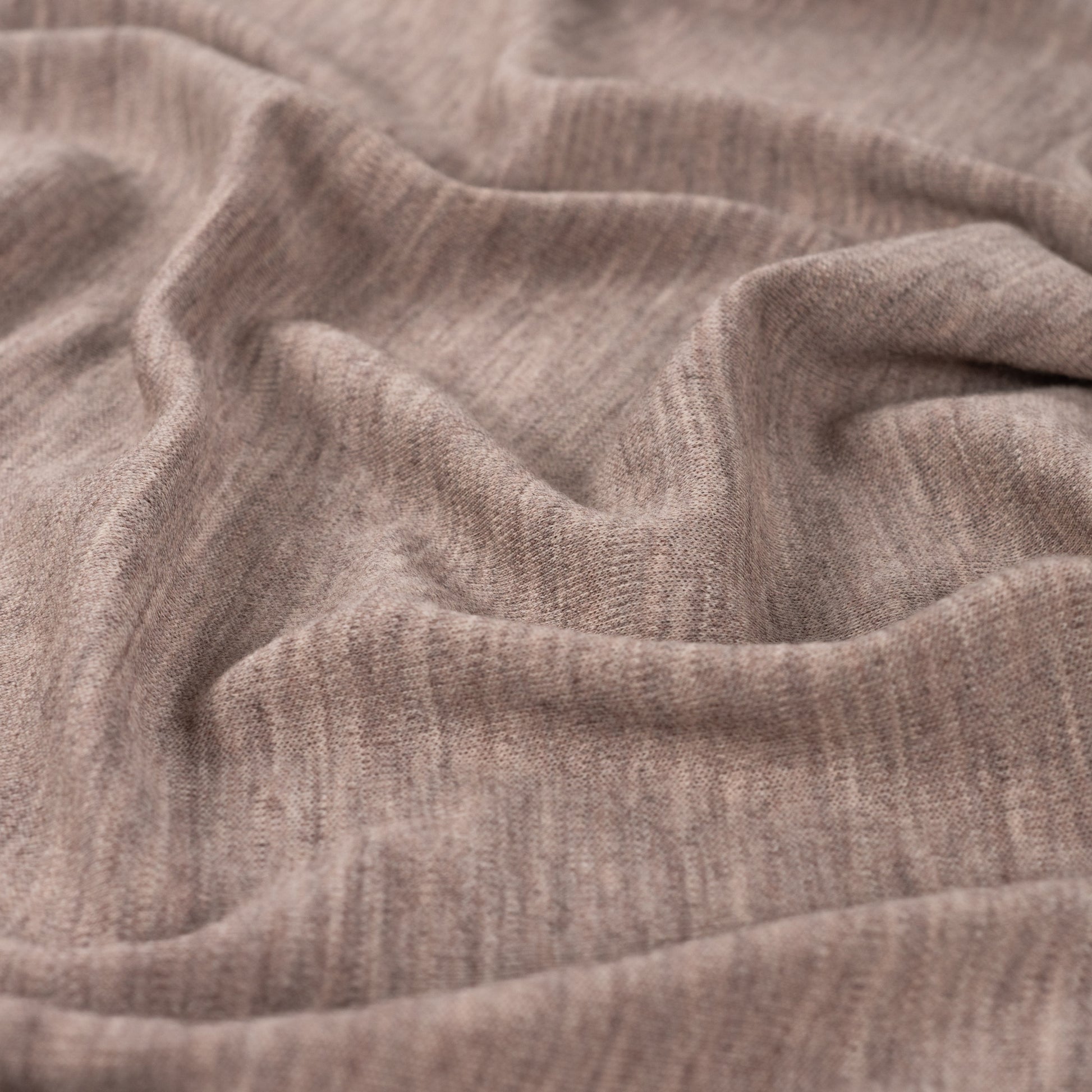 Merino Wolljersey in Sand aus feiner Schurwolle, weich, elastisch und atmungsaktiv. Ideal für Shirts, Kleider, Sportmode, Baby- und Kinderkleidung.