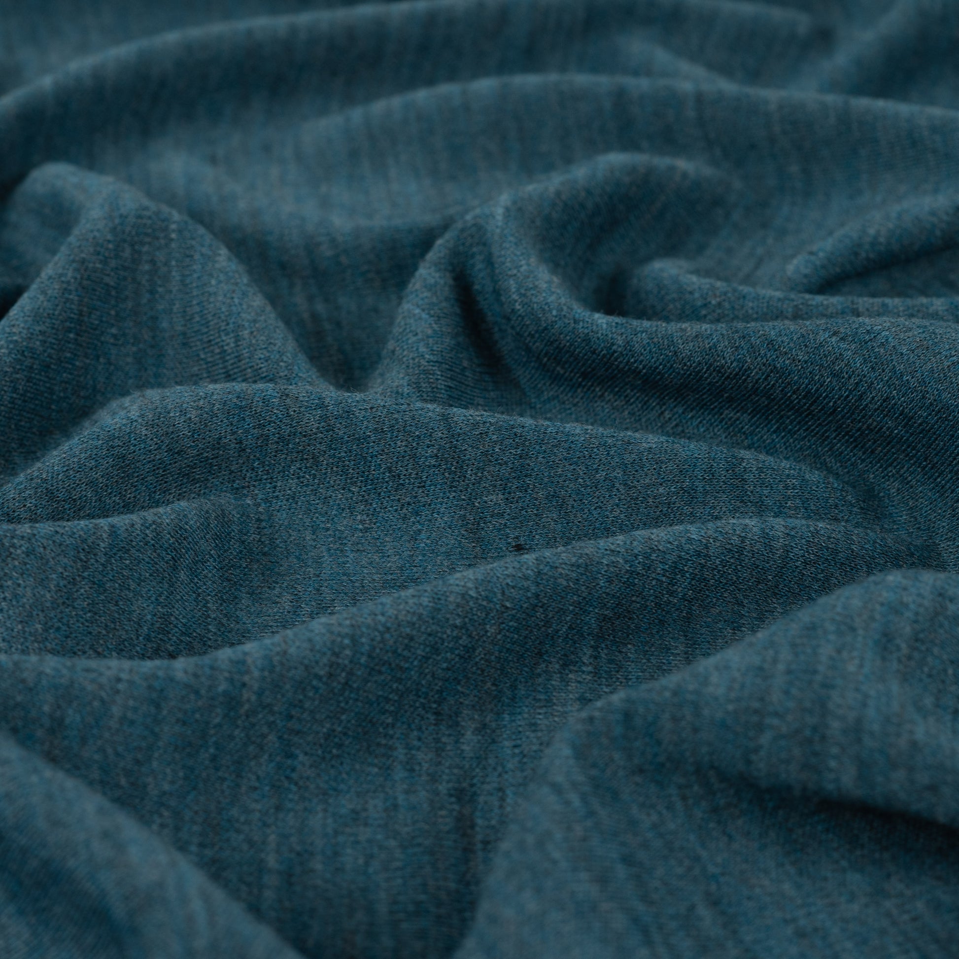Merino Wolljersey in Petrol aus feiner Schurwolle, weich, elastisch und atmungsaktiv. Ideal für Shirts, Kleider, Sportmode, Baby- und Kinderkleidung.