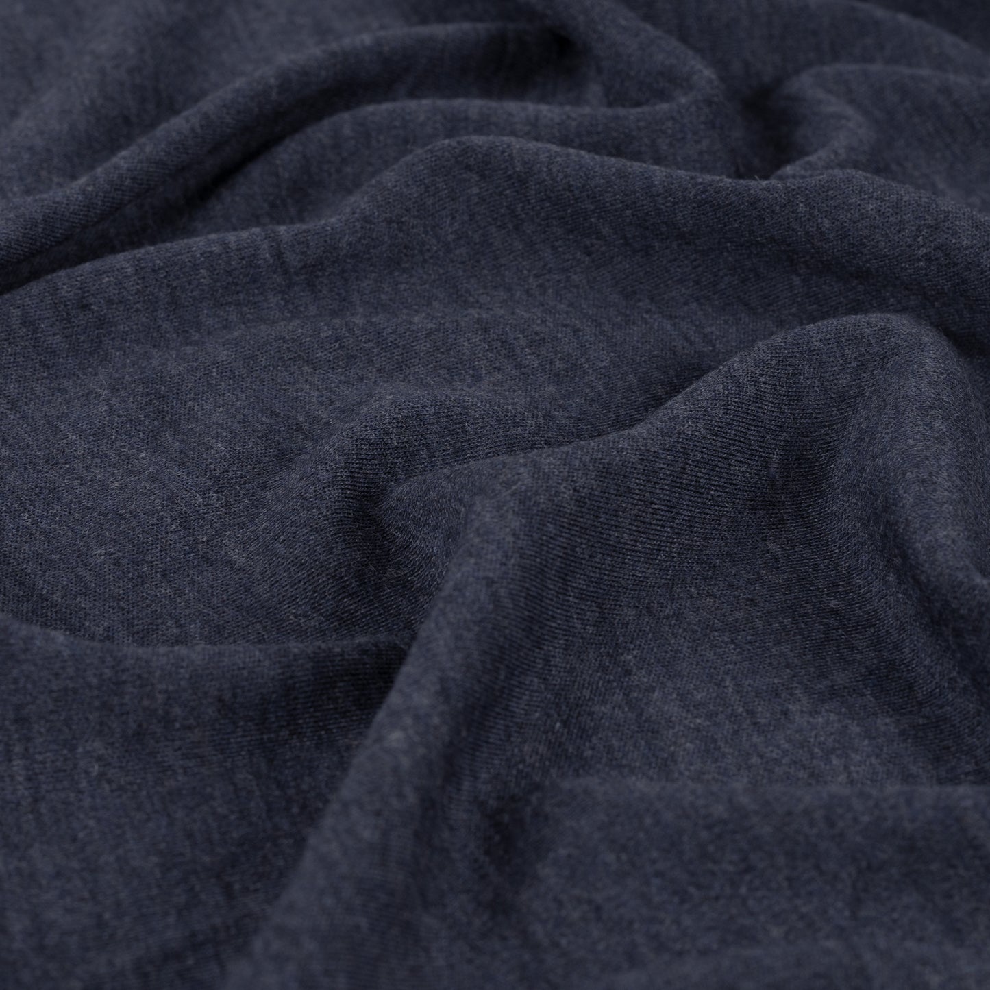 Merino Wolljersey in Dunkelblau aus feiner Schurwolle, weich, elastisch und atmungsaktiv. Ideal für Shirts, Kleider, Sportmode, Baby- und Kinderkleidung.