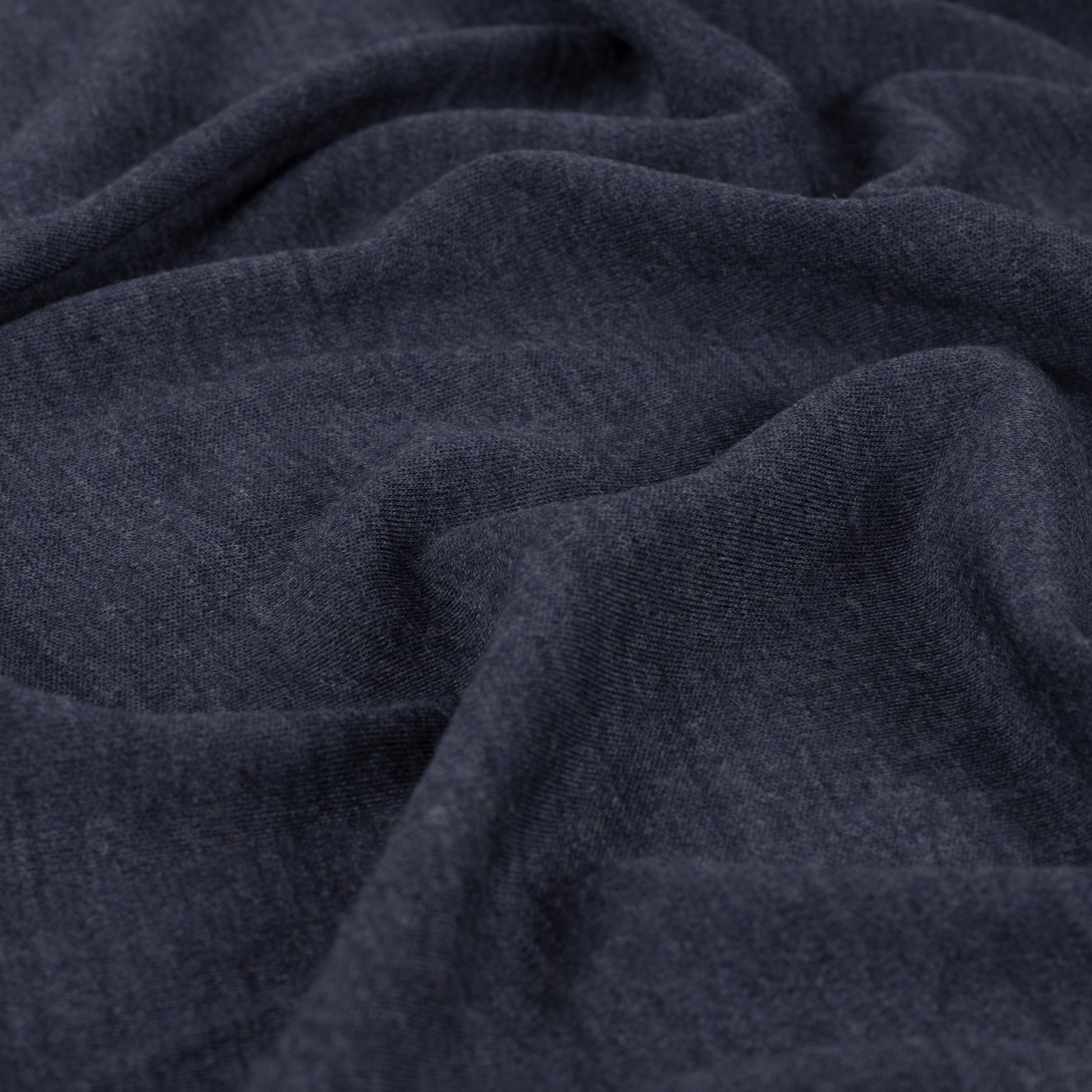 Merino Wolljersey in Dunkelblau aus feiner Schurwolle, weich, elastisch und atmungsaktiv. Ideal für Shirts, Kleider, Sportmode, Baby- und Kinderkleidung.