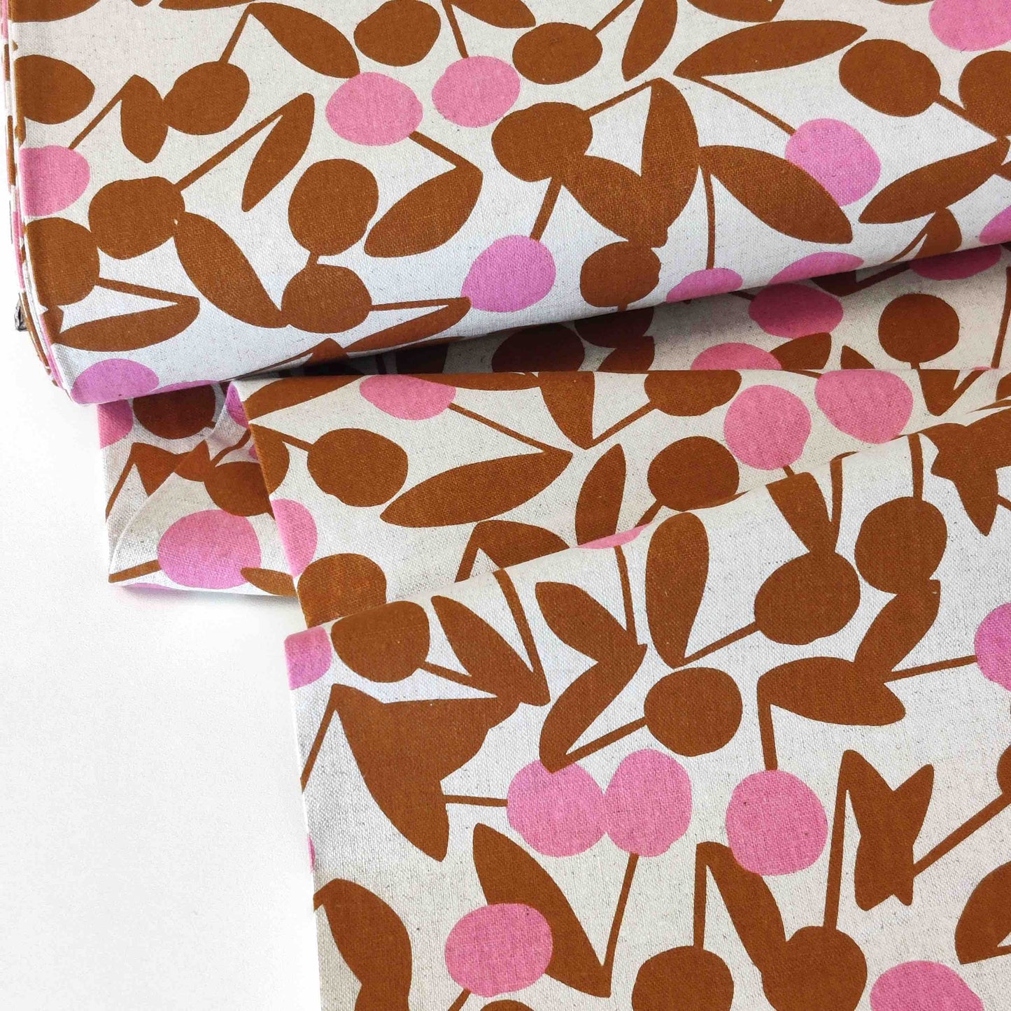 Japanischer Leinen-Baumwollstoff von Sevenberry mit grafischem Muster in Braun und Rosa.