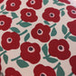 KOKKA Linnea Pure Blossom Oxford Baumwollstoff mit roten Blumen und türkisgrünen Blättern
