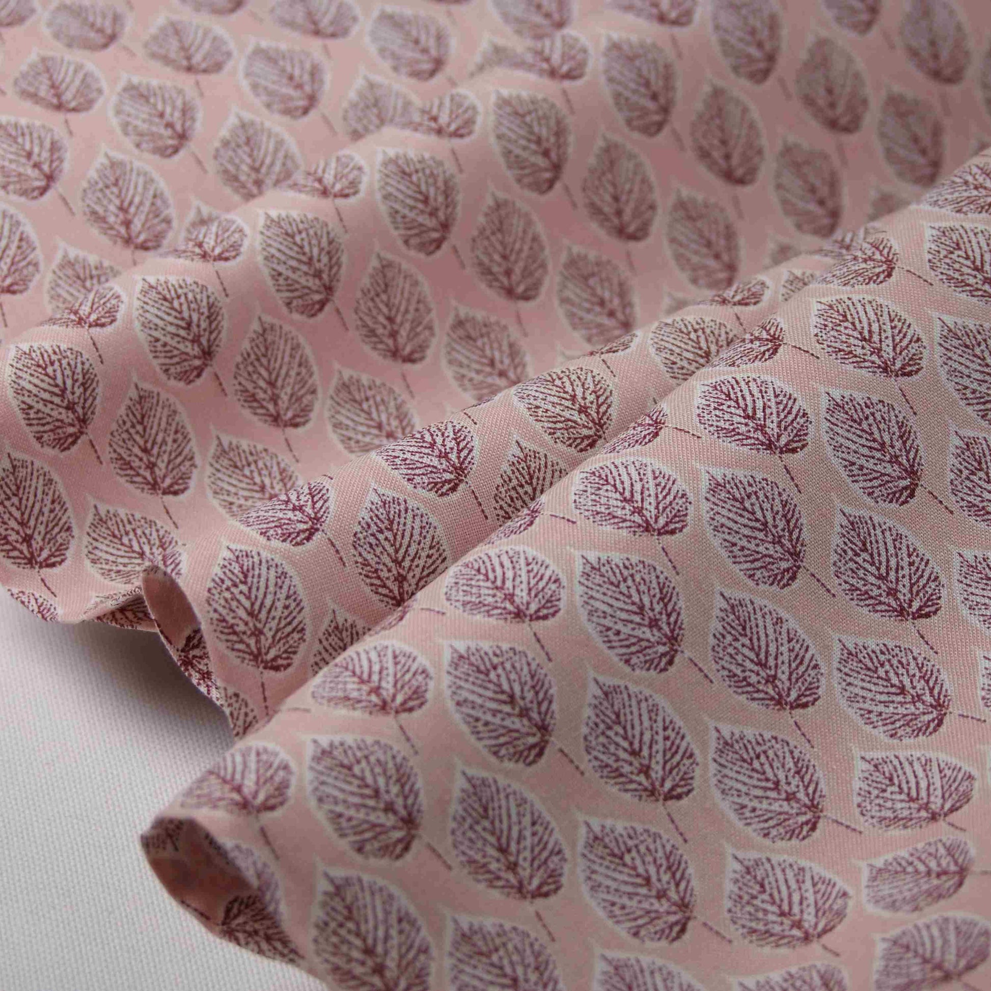 Baumwollstoff mit Blättern rosa